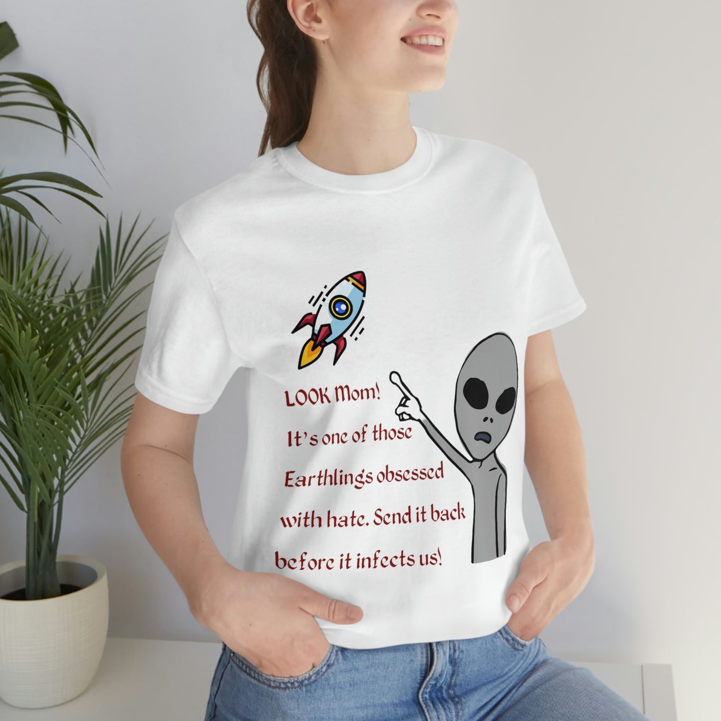 ‘LOOK Mom! It’s one of those Earthlings obsessed with hate. Send it back before it infects us!’ Unisex Jersey Short Sleeve Tee